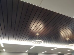 A ceiling with wood paneling 