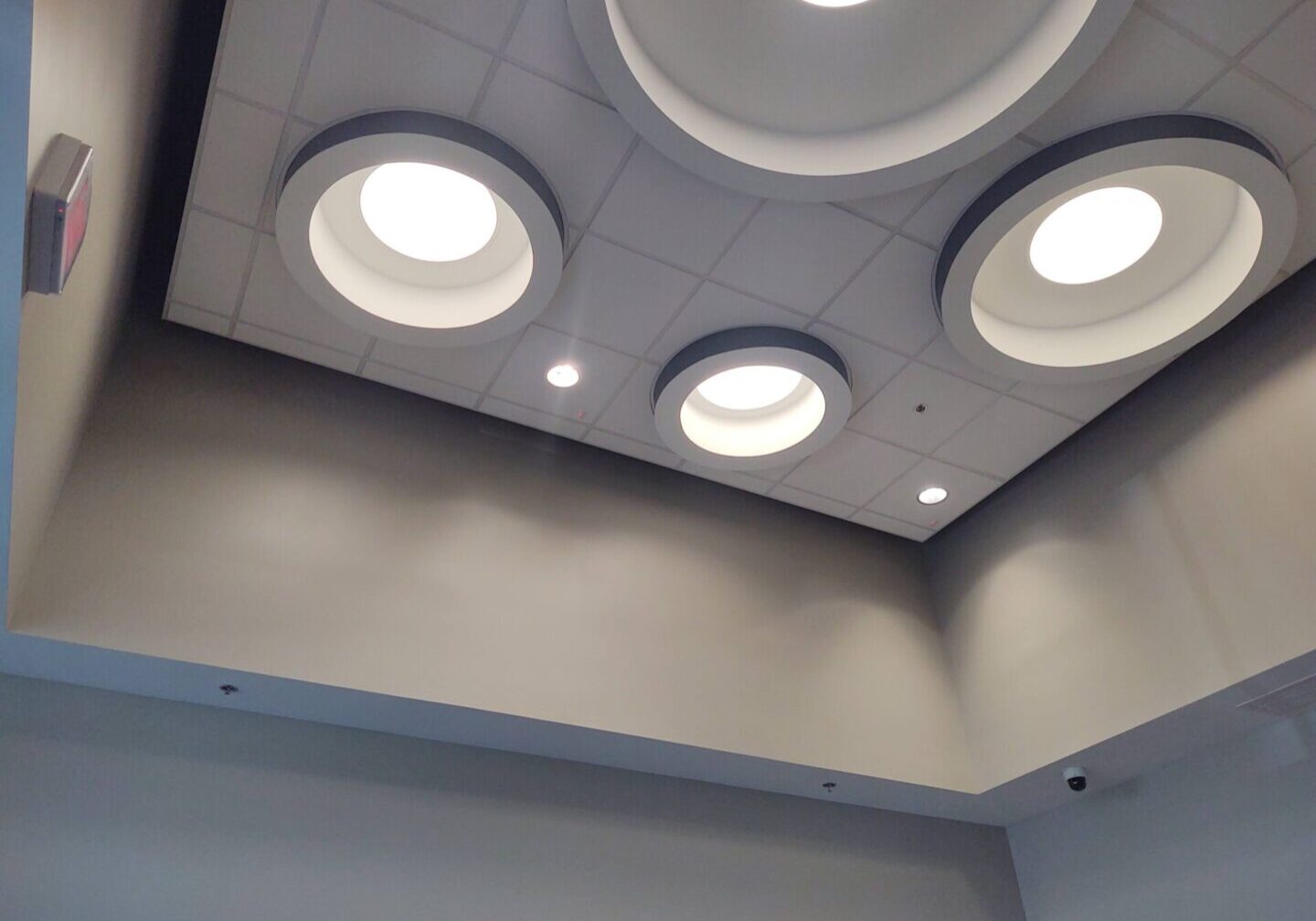 A ceiling with circle lights